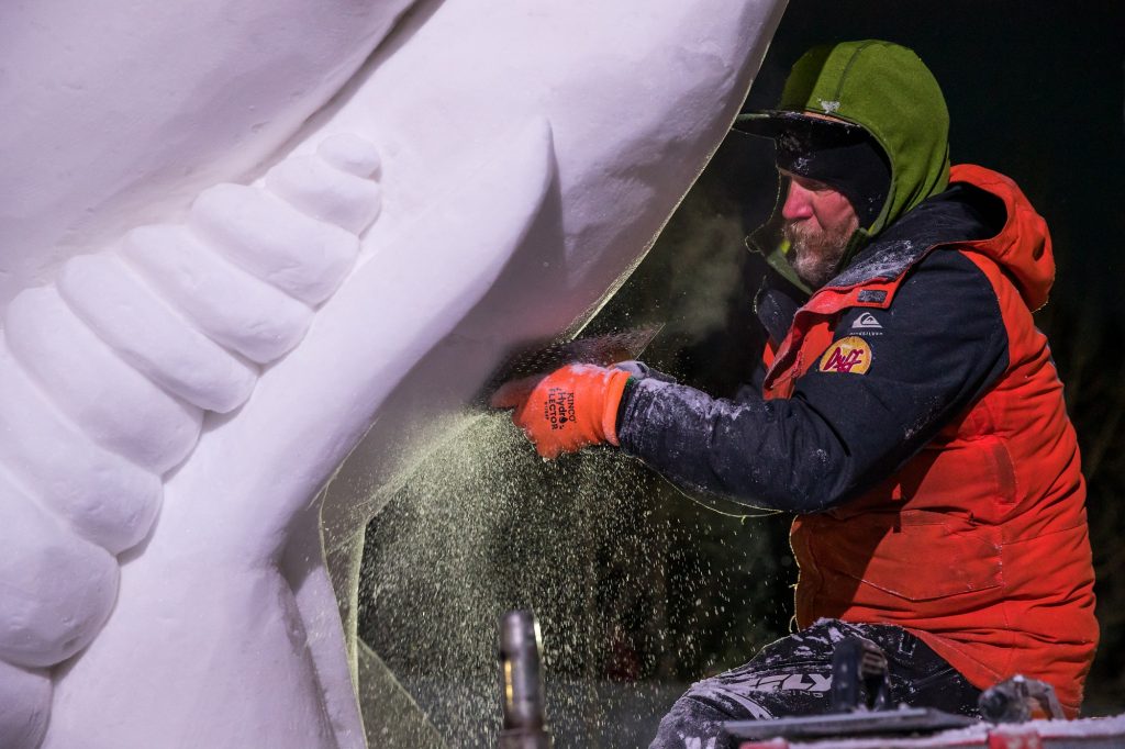 Carving Snow Sculptures at The Breckenridge International Snow Sculpture Championships 2024