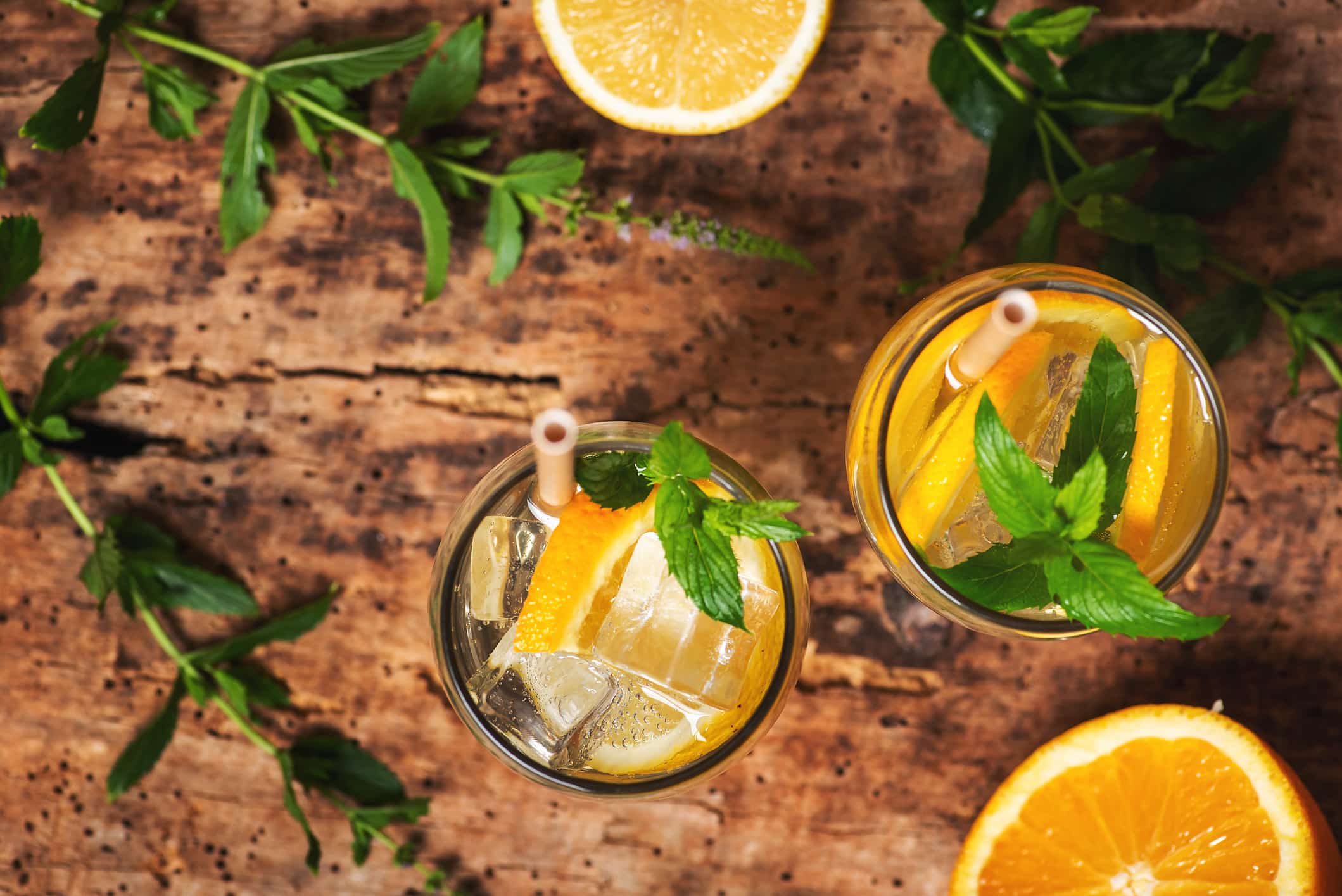 Lemonade with fruit slices infused with marijuana herbal cannabis in a jar closeup view
