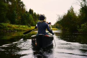 person in canoe