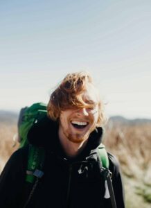 man smiling outside